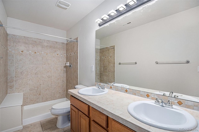 12710 Jasmine St Unit C, Thornton, CO 80602 - full bath featuring a sink, tile patterned floors, a tile shower, and toilet