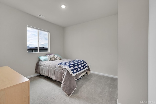 bedroom with recessed lighting, carpet flooring, visible vents, and baseboards