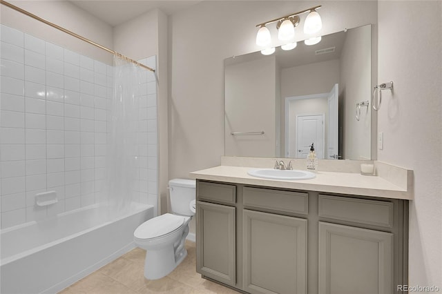 bathroom with toilet, visible vents, vanity, tile patterned floors, and washtub / shower combination