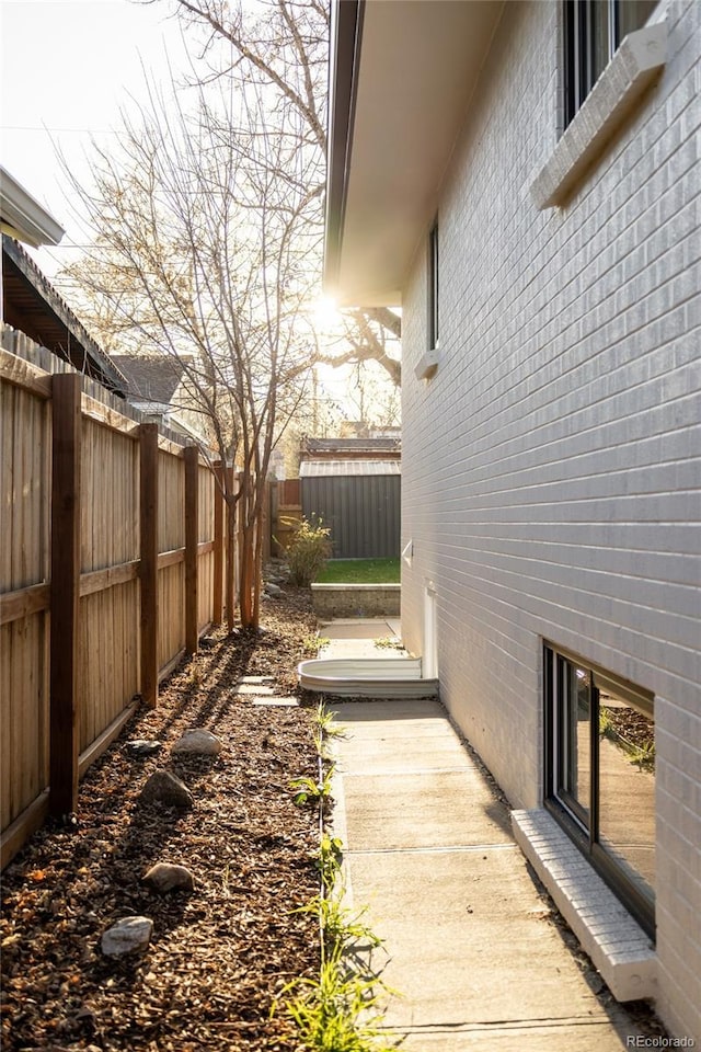 4631 Zuni St, Denver, CO 80211 - fenced backyard featuring an outdoor structure