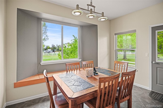 view of tiled dining space