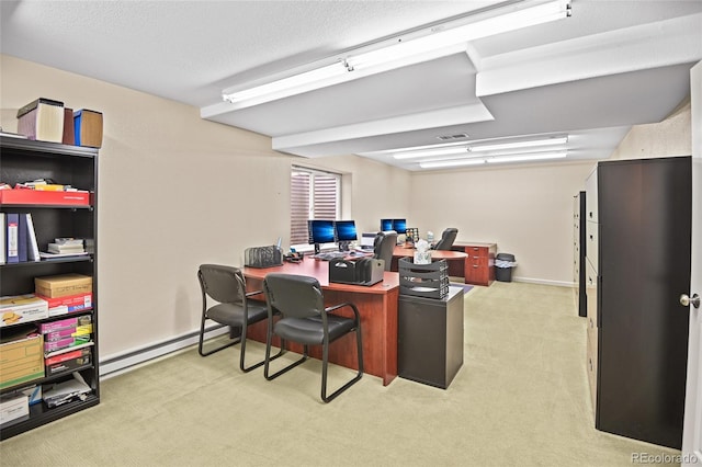 office area featuring baseboard heating, light colored carpet, and a textured ceiling