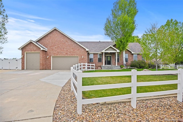 ranch-style home featuring a garage