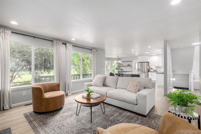 664 Clarendon Dr, Longmont, CO 80504 - living area with light wood-type flooring and recessed lighting