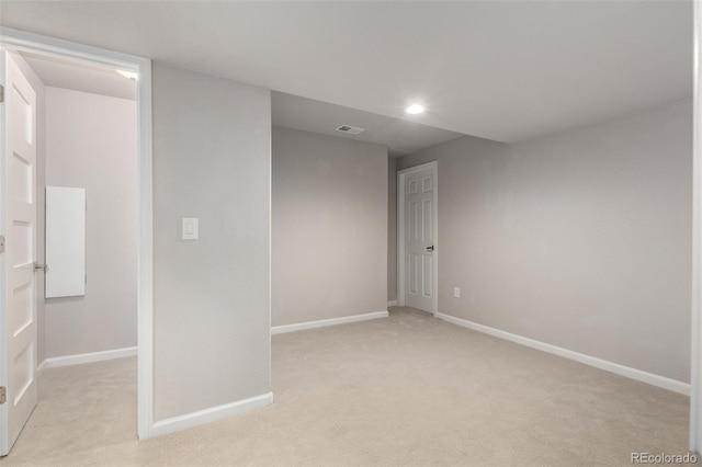 664 Clarendon Dr, Longmont, CO 80504 - below grade area featuring light colored carpet and recessed lighting