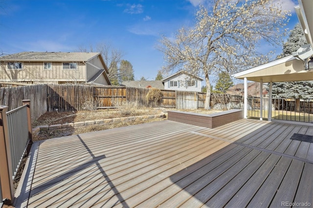 deck featuring a fenced backyard