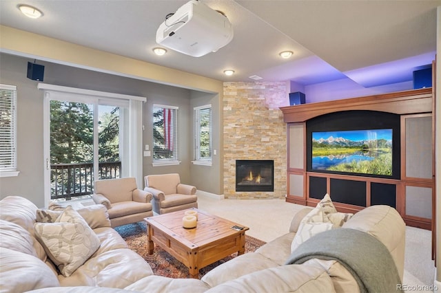 22419 Springflower Dr, Golden, CO 80401 - living room with baseboards, a stone fireplace, and carpet