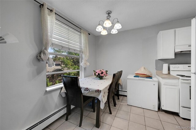 tiled dining area featuring a baseboard radiator and a chandelier