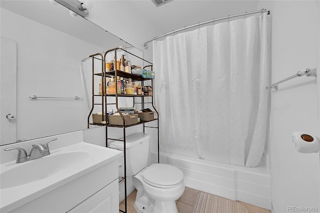 full bathroom with shower / bath combo with shower curtain, tile patterned floors, toilet, and vanity