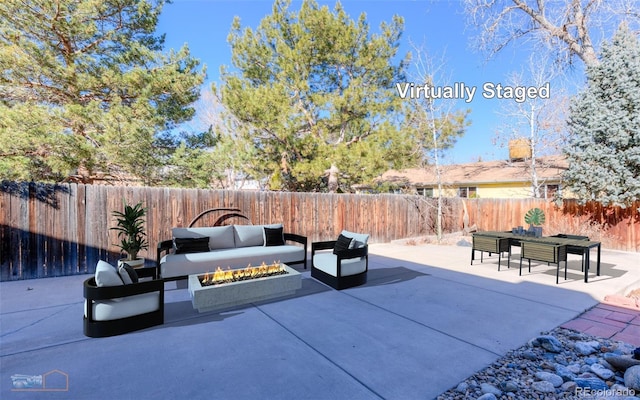 view of patio with a fenced backyard and outdoor lounge area