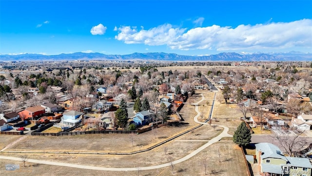 drone / aerial view featuring a mountain view and a residential view