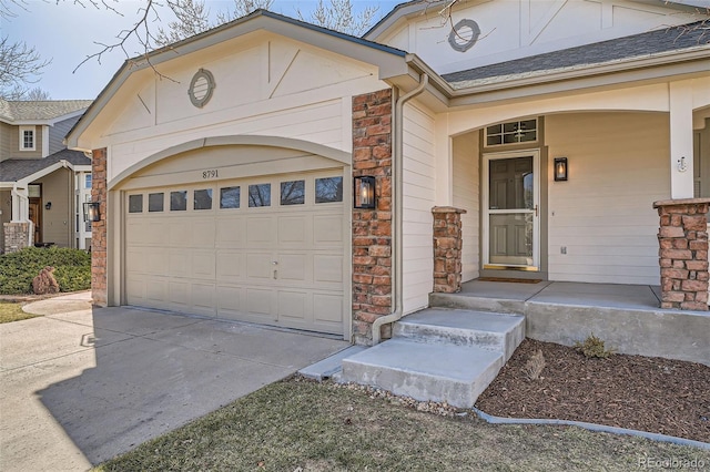 view of front facade featuring stone siding, roof with shingles, concrete driveway, and an attached garage