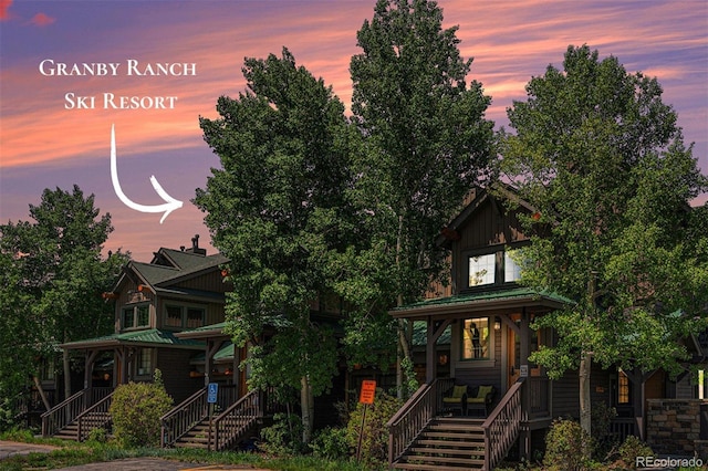 8305 Northstar Unit 8-305, Granby, CO 80446 - view of front facade with a porch, stairs, and board and batten siding