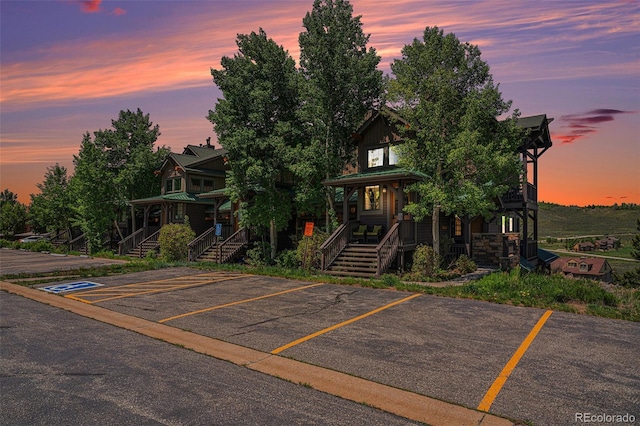 8305 Northstar Unit 8-305, Granby, CO 80446 - view of front of house with covered porch, uncovered parking, and stairs