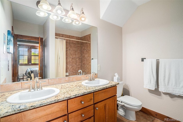 8305 Northstar Unit 8-305, Granby, CO 80446 - full bath with toilet, a tile shower, double vanity, tile patterned flooring, and baseboards