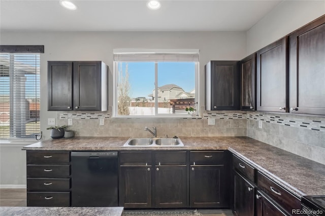 kitchen featuring black appliances, sink, dark brown cabinetry, and backsplash