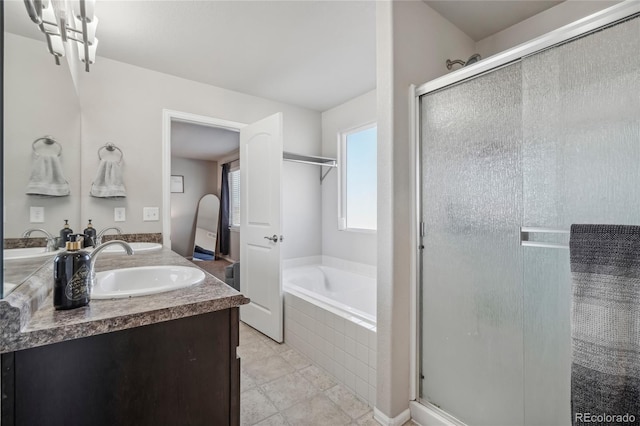 bathroom featuring separate shower and tub, tile patterned flooring, and vanity