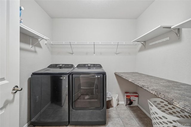 laundry room with independent washer and dryer