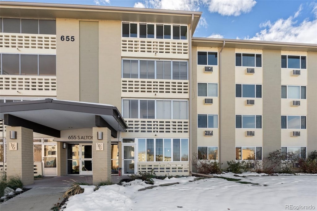 view of snow covered building