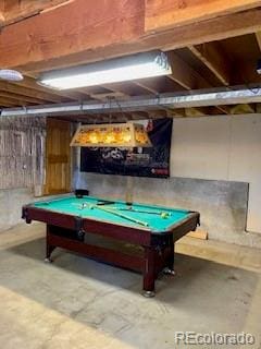 recreation room with billiards and concrete floors