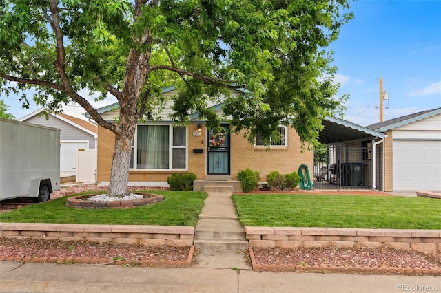 283 Leonard Ln, Northglenn, CO 80233 - view of front facade featuring brick siding, a front lawn, and a garage