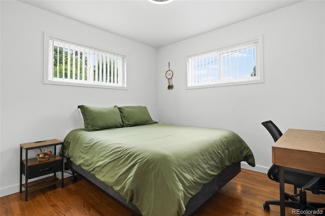 283 Leonard Ln, Northglenn, CO 80233 - bedroom with wood finished floors and a desk