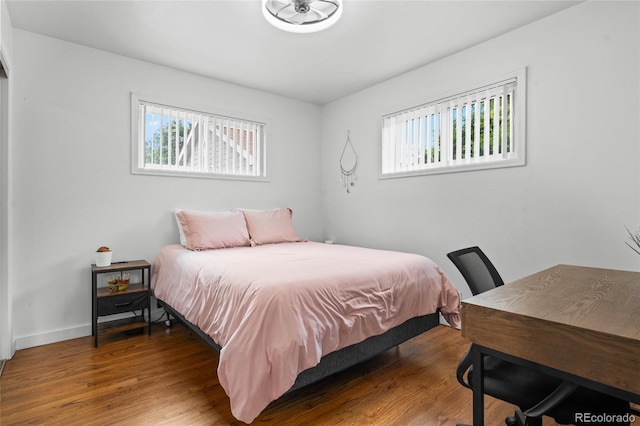 283 Leonard Ln, Northglenn, CO 80233 - bedroom with wood finished floors and baseboards
