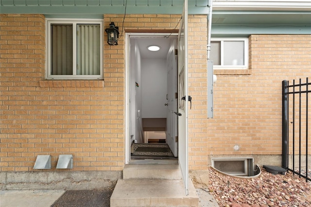 283 Leonard Ln, Northglenn, CO 80233 - doorway to property featuring brick siding