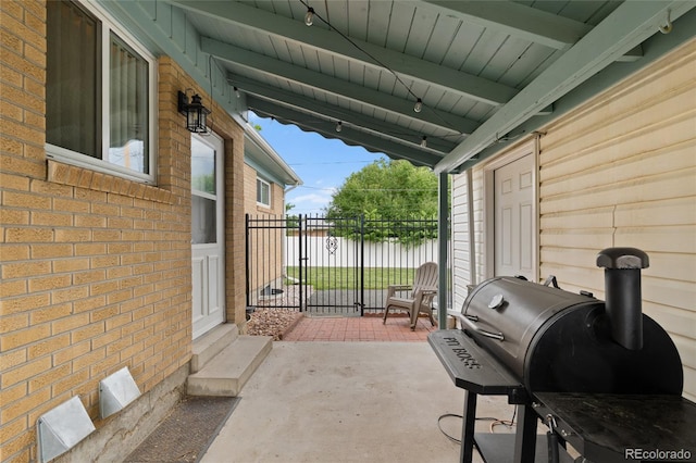 283 Leonard Ln, Northglenn, CO 80233 - view of patio featuring a water view, grilling area, and entry steps