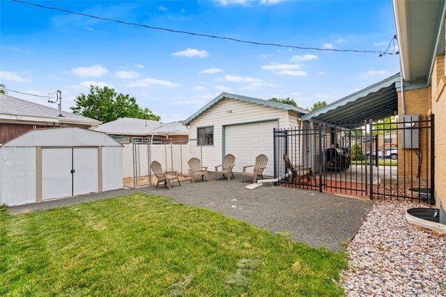 283 Leonard Ln, Northglenn, CO 80233 - back of property featuring a garage and a storage shed