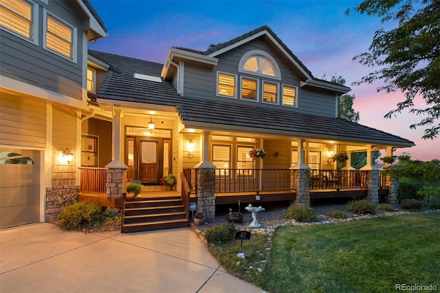 view of front of property featuring covered porch