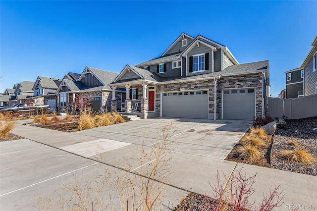 4104 N Picadilly Ct, Aurora, CO 80019 - craftsman inspired home with concrete driveway, a porch, stone siding, an attached garage, and a garage