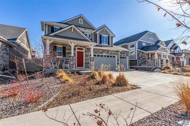 4104 N Picadilly Ct, Aurora, CO 80019 - craftsman house with covered porch, driveway, stone siding, and an attached garage