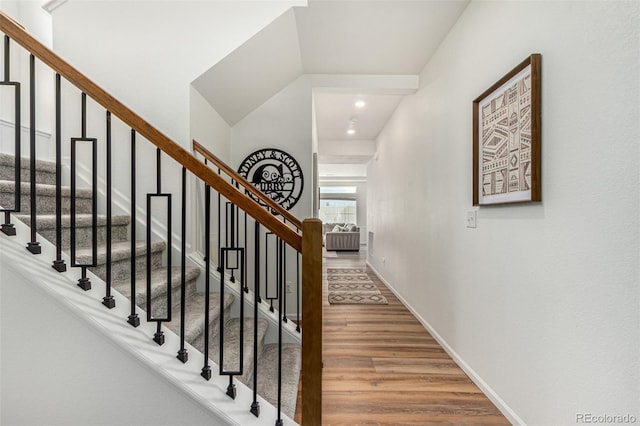 4104 N Picadilly Ct, Aurora, CO 80019 - staircase with wood finished floors and recessed lighting