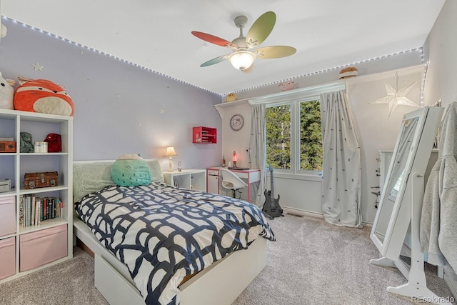 carpeted bedroom with ceiling fan and visible vents