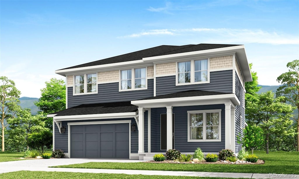 view of front facade featuring a front yard and a garage