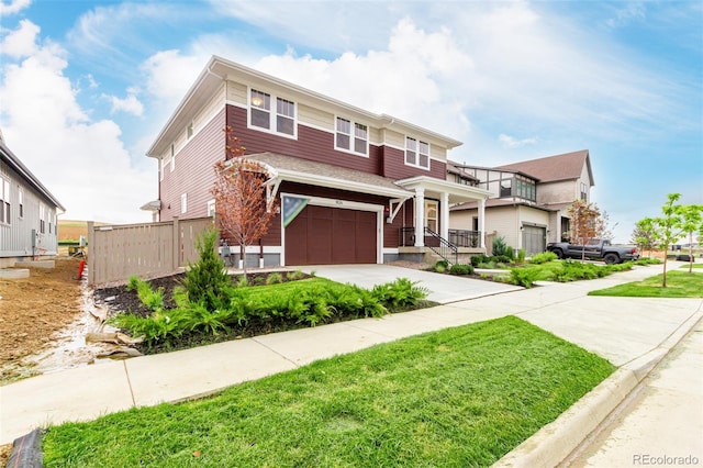 1826 Hickory Ave, Erie, CO 80516 - view of front facade with driveway, a garage, and a front yard