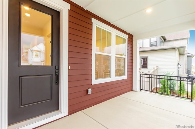 1826 Hickory Ave, Erie, CO 80516 - doorway to property featuring a porch