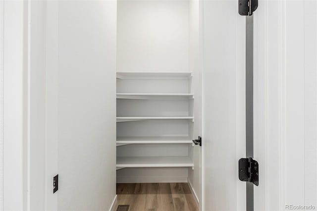 1826 Hickory Ave, Erie, CO 80516 - spacious closet with wood finished floors