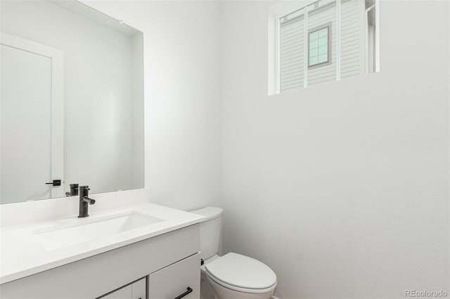 1826 Hickory Ave, Erie, CO 80516 - half bathroom with vanity and toilet