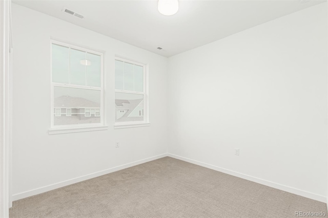 1826 Hickory Ave, Erie, CO 80516 - unfurnished room with baseboards and light colored carpet