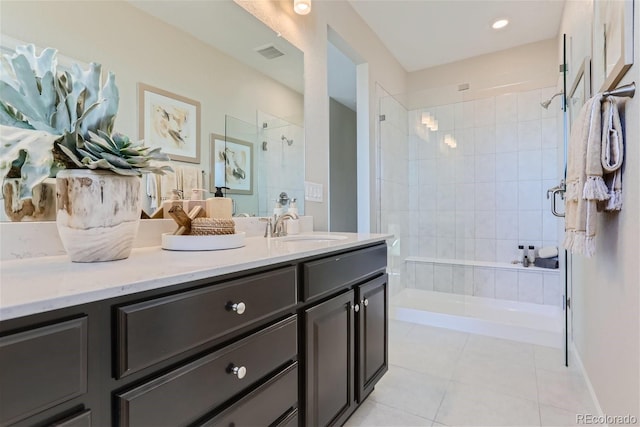 bathroom featuring vanity and tile patterned flooring