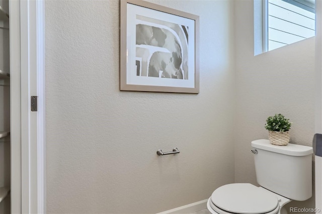 bathroom featuring toilet