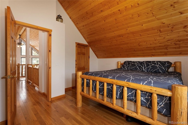 507 Gcr 4980, Grand Lake, CO 80447 - bedroom featuring vaulted ceiling, wood finished floors, baseboards, and wood ceiling