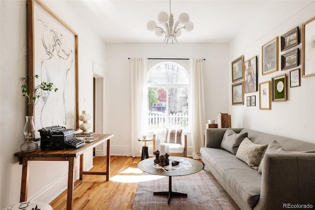 321 Fox St, Denver, CO 80223 - living area with wood finished floors and a chandelier