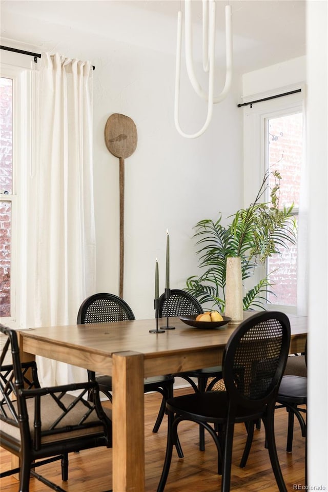 321 Fox St, Denver, CO 80223 - dining space featuring light wood-style flooring