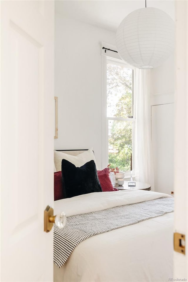 321 Fox St, Denver, CO 80223 - bedroom with multiple windows