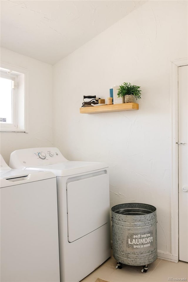 321 Fox St, Denver, CO 80223 - clothes washing area featuring washing machine and dryer