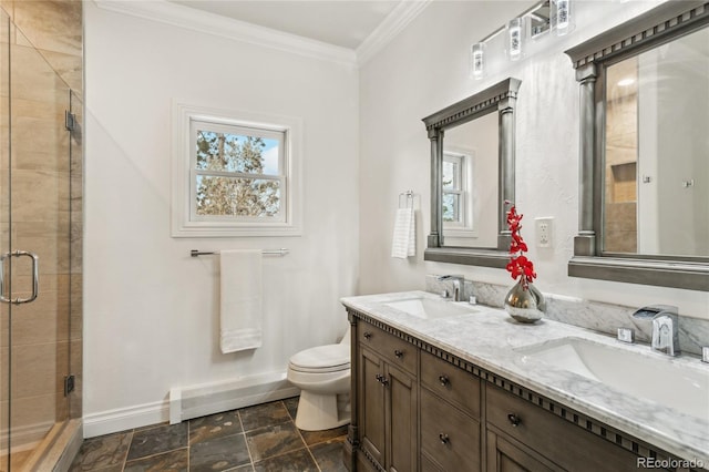 bathroom featuring baseboards, ornamental molding, a sink, and a shower stall