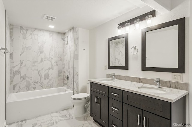 full bath with marble finish floor, bathtub / shower combination, a sink, and visible vents